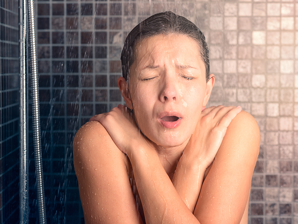 woman in cold shower